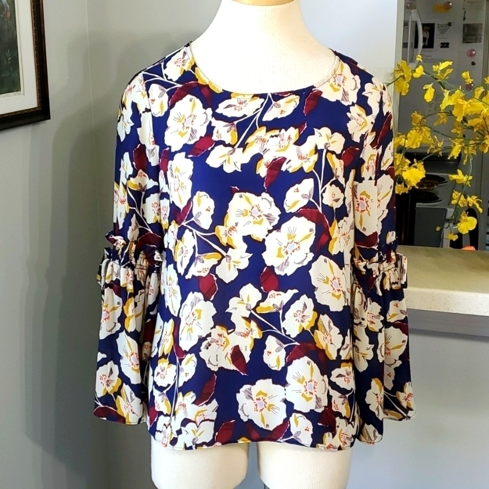 ROSE‎ +OLIVE, blouse size small.  Beautiful bell sleeves. Floral print. Blue